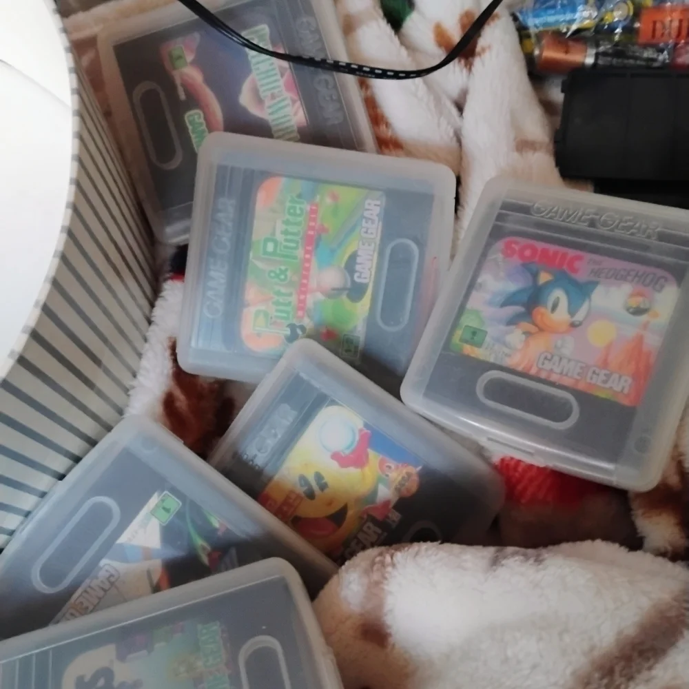 SEGA Game Gear Handheld Console No Scratches. Comes With TV Adapter And 6 Games